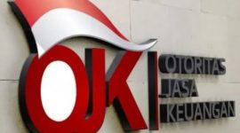 Logo Otoritas Jasa Keuangan OJK di kantor Menara Radius Prawiro, Jakarta. OJK menyatakan dukungan penuh terhadap program prioritas pemerintah 3 juta rumah melalui penguatan kebijakan SLIK. (Foto: Dok. OJK)