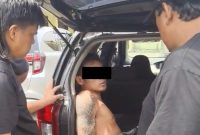 Tersangka WO alias Tole saat diamankan Tim Tekab 308 Polres Lampung Tengah di Bandar Jaya, Lampung Tengah, Senin (18/5/2026). 