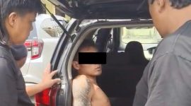 Tersangka WO alias Tole saat diamankan Tim Tekab 308 Polres Lampung Tengah di Bandar Jaya, Lampung Tengah, Senin (18/5/2026). 