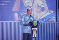 Kadiskominfotiksan Provinsi Lampung, Ganjar Jationo, membacakan sambutan Gubernur Lampung pada Puncak Penganugerahan Duta Bahasa Provinsi Lampung 2026 di Balai Keratun, Sabtu (23/5/2026).