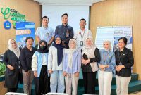 Peserta kuliah umum Pegadaian Unila berfoto bersama di Gade Creative Lounge Universitas Lampung, Mei 2026.