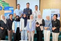 Peserta kuliah umum Pegadaian Unila berfoto bersama di Gade Creative Lounge Universitas Lampung, Mei 2026.
