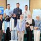 Peserta kuliah umum Pegadaian Unila berfoto bersama di Gade Creative Lounge Universitas Lampung, Mei 2026.