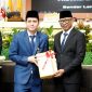 Gubernur Lampung Rahmat Mirzani Djausal menerima Laporan Hasil Pemeriksaan LHP WTP dari BPK RI di Ruang Sidang DPRD Provinsi Lampung, Jumat 12/6/2026. PROYEKSI.ID/ Istimewa
