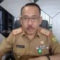 Kepala Dinas Kesehatan Dinkes Kota Bandar Lampung Muhtadi A. Temenggung saat menyampaikan keterangan terkait kompetisi "Olimpiade Puskesmas" 2026 di ruang kerjanya, Senin 22/6/2026. Dinkes menggelar lomba antar puskesmas untuk meningkatkan kualitas layanan dan inovasi. PROYEKSI.ID FOTO/Dok.
