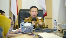 Sekretaris Daerah Provinsi Lampung Marindo Kurniawan memaparkan pemanfaatan super aplikasi Lampung-In sebagai dasar pengambilan kebijakan saat visitasi ASKOMPSI Digital Leadership Government Award 2026 di Kantor Gubernur Lampung, Selasa (21/7/2026).