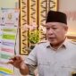 Wakil Ketua Pansus DPRD Kota Bandar Lampung Yuhadi saat memberikan keterangan terkait pembahasan temuan BPK, Selasa (14/7/2026). Ia menyebut tidak ada larangan bagi media untuk meliput. Foto: PROYEKSI.ID